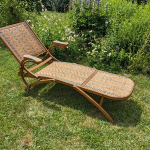 Ancienne chaise longue en rotin 1920
